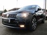 USED 2018 68 VOLKSWAGEN TIGUAN 2.0 R-LINE TDI DSG 5d 148 BHP Finished in DEEP BLACK with contrasting Alcantara trim. This high spec Tiguan has a more sophisticated look to add to its high quality interior and high spec. In short this Tiguan is spacious, comfortable and great to drive, while its raised driving position gives you a great view. Features include, Pan Roof, Sat Nav, DAB, B/Tooth, ALLOYS, 20" Alloys, Front and Rear Park Sensors and much more. Dealer serviced at 20310 miles, 38868 miles an at 54641 miles. 12 Months MOT.