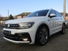 USED 2017 67 VOLKSWAGEN TIGUAN 2.0 R LINE TDI BMT 4MOTION DSG 5d 148 BHP Finished in PURE WHITE with contrasting HEATED ALCANTARA LEATHER trim. This high spec Tiguan has a more sophisticated look to add to its high quality interior and high spec. In short this Tiguan is spacious, comfortable and great to drive, while its raised driving position gives you a great view. Features include, Pan Roof, Virtual Dash, Sat Nav, DAB Radio, 20" ALLOYS, Cruise control, Electric Boot, Front and Rear Park Sensors and much more. Dealer serviced at 18828 miles and on arrival at 41716