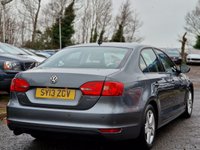 USED 2013 13 VOLKSWAGEN JETTA 1.6 SE TDI BLUEMOTION TECHNOLOGY DSG 4d 104 BHP GOOD SERVICE RECORD +  BLUETOOTH +  DAB RADIO +  AUX CONNECTION +  REAR PARKING SENSORS +  FULL LEATHER TRIM +  FRONT HEATED SEATS +  START STOP +  SPARE WHEEL +  16 INCH ALLOY WHEELS +