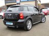 USED 2014 64 MINI COUNTRYMAN 2.0 COOPER D ALL4 5d 110 BHP Finished in ABSOLUTE BLACK with contrasting BLACK trim. This 4x4 Mini is a quirky, economical and fun SUV, packed with great specification. It offers all the practicality of a family hatch, plus the fun of a MINI, combined with the promise of all-weather traction. Features include Sat Nav, Heated Seats, Dab Radio, B/Tooth, Cruise and Climate. Dealer serviced at 16560 miles, 29164 miles, 35129 miles, 42397 miles, 53861 miles and at 59677 miles (Which included New Timing Chain). Comes with 2 keys.