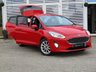 USED 2018 18 FORD FIESTA 1.0 TITANIUM 5d 99 BHP Finished in RACE RED with contrasting GREY Cloth Trim. This Fiesta is a small family high spec 5 door car that you can really enjoy driving. Economical and cheap to run, stylish to look at and some great features. Specification includes Sat Nav, DAB Radio, Power Folding Door Mirrors, B/Tooth, Alloys, Air Con, Heated front Screen and much more, makes this a must for the first time driver or small family.