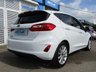 USED 2018 18 FORD FIESTA 1.0 TITANIUM 5d 99 BHP Finished in FROZEN WHITE with contrasting GREY CLOTH interior trim. This Fiesta is a small family 5 door car that you can really enjoy driving. Economical and cheap to run, stylish to look at and some great features. Specification includes, SAT NAV, DAB RADIO, B/Tooth, Alloys, Air Con, Heated front Screen and much more, makes this a must for the first time driver or small family. Dealer serviced at 36427 miles, 65360 miles and on arrival at 79877 miles.