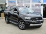 USED 2020 70 FORD RANGER 2.0 WILDTRAK ECOBLUE 210 BHP Finished in SHAODOW BLACK MET with FULL HEATED LEATHER TRIM. This one of the best selling Pick Ups on the market today. Take a look at this today and you will see why many drivers would love to own a Ford Ranger. Features include balance of Ford Warranty (until Sept), Carryboy Back Box, Side Steps, Heated Leather, Sat Nav, DAB Radio, Rear Camera, Alloys, B/Tooth and much more. Dealer serviced at 9049 miles and at 17368 miles.
