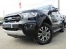 USED 2020 70 FORD RANGER 2.0 WILDTRAK ECOBLUE 210 BHP Finished in SHAODOW BLACK MET with FULL HEATED LEATHER TRIM. This one of the best selling Pick Ups on the market today. Take a look at this today and you will see why many drivers would love to own a Ford Ranger. Features include balance of Ford Warranty (until Sept), Carryboy Back Box, Side Steps, Heated Leather, Sat Nav, DAB Radio, Rear Camera, Alloys, B/Tooth and much more. Dealer serviced at 9049 miles and at 17368 miles.