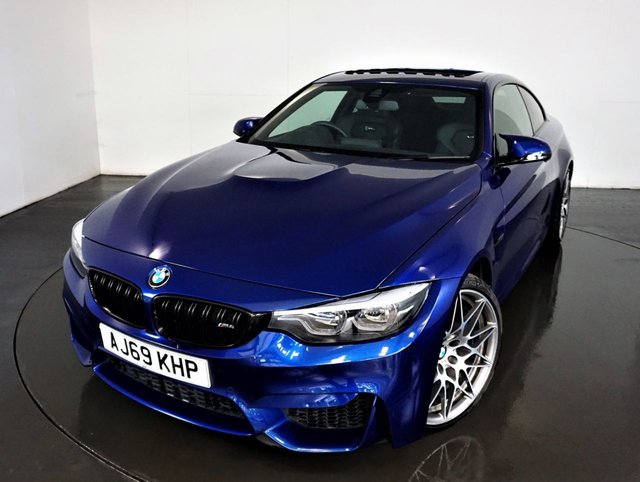 2020 69 BMW M4 3.0 M4 COMPETITION 2d AUTO 444 BHP-RUNNING IN SERVICE COMPLETED AT 1,553 MILES 01/06/2020-1 PRIVATE OWNER-REGISTERED FEB 2020-RUNNING IN SERVICE COMPLETE-FINISHED IN SAN MARINO METALLIC-HEATED BLACK MERINO LEATHER-COMPETITION PACKAGE-HIGH GLOSS SHADOW LINE-ELECTRIC GLASS SUNROOF-FACTORY PRIVACY GLASS-ELECTRIC MEMORY DRIVERS SEAT-RETRACTABLE FRONT ARMREST-M SEAT BELTS-DUAL CLIMATE CONTROL-CRUISE CONTROL-BLUETOOTH-DAB RADIO-PROFESSIONAL SATNAV-FANTASTIC LOW MILEAGE 1 OWNER EXAMPLE-ADAPTIVE LED HEADLIGHTS-HEAD UP DISPLAY-WIRELESS CHARGING