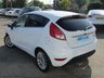 USED 2013 63 FORD FIESTA 1.6 TITANIUM 5d 104 BHP Finished in FROZEN WHITE with contrasting GREY Cloth Trim. This Fiesta is a small family high spec 5 door AUTO car that you can really enjoy driving. Economical and cheap to run, stylish to look at and some great features. Specification includes  DAB Radio, Power Folding Door Mirrors, B/Tooth, Alloys, Air Con, Heated front Screen and much more. Dealer serviced 6986 miles, 14340 miles, 24593 miles, 29597 miles, 35626 miles, 39841 miles, 42361 miles and at 47452 miles.