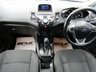 USED 2013 63 FORD FIESTA 1.6 TITANIUM 5d 104 BHP Finished in FROZEN WHITE with contrasting GREY Cloth Trim. This Fiesta is a small family high spec 5 door AUTO car that you can really enjoy driving. Economical and cheap to run, stylish to look at and some great features. Specification includes  DAB Radio, Power Folding Door Mirrors, B/Tooth, Alloys, Air Con, Heated front Screen and much more. Dealer serviced 6986 miles, 14340 miles, 24593 miles, 29597 miles, 35626 miles, 39841 miles, 42361 miles and at 47452 miles.