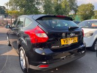USED 2012 12 FORD FOCUS 1.6 ZETEC 5d 124 BHP 1 FORMER KEEPER, COMPREHENSIVE SERVICE HISTORY INCLUDING 11 STAMPS!!, LONG MOT UNTIL FEB 2024.FINISHED IN METALLIC PANTHER BLACK COLOUR.  THIS BEING THE ZETEC MODEL COMES WITH GREAT SPEC INCLUDING ISOFIX, FRONT FOG LIGHTS, REAR PARKING SENSORS, BLUETOOTH, HEATED WINDSCREEN, ELECTRIC WINDOWS AND MIRRORS, ALLOY WHEELS, MULTI FUNCTION STEERING WHEEL, REMOTE CENTRAL LOCKING AND AIR CON. + 3 MONTHS WARRANTY AND 12 MONTHS AA BREAKDOWN COVER