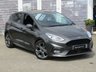 USED 2019 19 FORD FIESTA 1.0 ST-LINE 5d 99 BHP The car has just been serviced and comes with 12 months of MOT (Ministry of Transport) certification. This indicates that it has been recently maintained and is in good condition. Overall, the Ford Fiesta 1.0 ST-Line 5 DR 99 BHP in Magnetic Grey Metallic offers an enjoyable driving experience, fuel efficiency, stylish design, and a range of features that make it suitable for first-time drivers or small families.