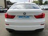 USED 2014 14 BMW 5 SERIES GRAN TURISMO 2.0 520D M SPORT GRAN TURISMO 5d 181 BHP Finished in ALPINE WHITE with BLACK HEATED LEATHER. This 5 Series Gran Turismo brings SUV, large estate and luxury saloon qualities to a package that offers you something very different. There's nothing quite like it. It has a luxury interior, amazing rear passenger space and a clever two-piece tailgate which opens like a boot or a hatchback. Features include Pan Roof, Sat Nav, DAB Radio, Heated Leather, 20" alloys, Rear View camera, Soft close doors, B/Tooth and much more. Dealer serviced