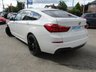 USED 2014 14 BMW 5 SERIES GRAN TURISMO 2.0 520D M SPORT GRAN TURISMO 5d 181 BHP Finished in ALPINE WHITE with BLACK HEATED LEATHER. This 5 Series Gran Turismo brings SUV, large estate and luxury saloon qualities to a package that offers you something very different. There's nothing quite like it. It has a luxury interior, amazing rear passenger space and a clever two-piece tailgate which opens like a boot or a hatchback. Features include Pan Roof, Sat Nav, DAB Radio, Heated Leather, 20" alloys, Rear View camera, Soft close doors, B/Tooth and much more. Dealer serviced