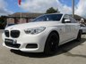 USED 2014 14 BMW 5 SERIES GRAN TURISMO 2.0 520D M SPORT GRAN TURISMO 5d 181 BHP Finished in ALPINE WHITE with BLACK HEATED LEATHER. This 5 Series Gran Turismo brings SUV, large estate and luxury saloon qualities to a package that offers you something very different. There's nothing quite like it. It has a luxury interior, amazing rear passenger space and a clever two-piece tailgate which opens like a boot or a hatchback. Features include Pan Roof, Sat Nav, DAB Radio, Heated Leather, 20" alloys, Rear View camera, Soft close doors, B/Tooth and much more. Dealer serviced