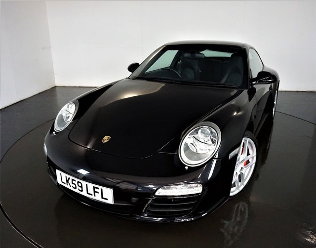 2009 59 Porsche 911 997 GEN 2 3.8 CARRERA 2S PDK 2d AUTO 385 BHP-2 FORMER KEEPERS-FINISHED IN BASALT BLACK METALLIC WITH HEATED BLACK LEATHER-REAR PARK ASSIST-SPORT CHRONO PACKAGE-BLUETOOTH-THREE SPOKE MULTI FUNCTION STEERING WHEEL-CLIMATE CONTROL-SATNAV-A FANTASTIC EXAMPLE WITH SUPERB MILEAGE