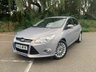 USED 2013 13 FORD FOCUS 1.0 TITANIUM X 5d 99 BHP ULEZ COMPLIANT - This isn't just any Ford Focus; it's the Titanium X trim, the pinnacle of the range, and it comes with an exciting Micastone Metallic finish that turns heads wherever it goes. With a combined MPG of 58.9, this car delivers not only style but also impressive efficiency.