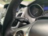 USED 2013 13 FORD FOCUS 1.0 TITANIUM X 5d 99 BHP ULEZ COMPLIANT - This isn't just any Ford Focus; it's the Titanium X trim, the pinnacle of the range, and it comes with an exciting Micastone Metallic finish that turns heads wherever it goes. With a combined MPG of 58.9, this car delivers not only style but also impressive efficiency.