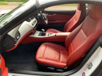 USED 2009 09 BMW Z4 3.0 Z4 S-DRIVE 30I ROADSTER 2d 254 BHP 2009 BMW Z4 3.0 CONVERTIBLE ROADSTER S-DRIVE 2DR - 3 FORMER KEEPERS - FULL SERVICE HISTORY - CORAL RED KANSAS PREMIUM LEATHER SPORTS SEATS - SATELLITE NAVIGATION - 19 INCH UPGRADE ALLOYS