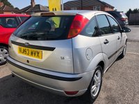 USED 2003 53 FORD FOCUS 1.6 ZETEC 5d 99 BHP AUTOMATIC, 1 FORMER KEEPER, SERVICE HISTORY, NEW MOT, CD/RADIO, ELECTRIC WINDOWS, REMOTE CENTRAL LOCKING, FRONT FOG LIGHTS, ALLOY WHEELS AND CLOTH INTERIOR. CHEAP AUTOMATIC CARS ARE VERY SOUGHT AFTER AND WONT BE AROUND FOR LONG!