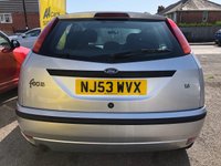 USED 2003 53 FORD FOCUS 1.6 ZETEC 5d 99 BHP AUTOMATIC, 1 FORMER KEEPER, SERVICE HISTORY, NEW MOT, CD/RADIO, ELECTRIC WINDOWS, REMOTE CENTRAL LOCKING, FRONT FOG LIGHTS, ALLOY WHEELS AND CLOTH INTERIOR. CHEAP AUTOMATIC CARS ARE VERY SOUGHT AFTER AND WONT BE AROUND FOR LONG!
