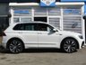 USED 2017 17 VOLKSWAGEN TIGUAN 2.0 R LINE TDI BMT 4MOTION DSG 5d 148 BHP Finished in PURE WHITE with Heated Grey trim. This Tiguan has a more sophisticated look to add to its high quality interior. In short this Tiguan is spacious, comfortable and great to drive, while its raised driving position gives you a great view. Features include, Apple Play, Alloys, Pan Roof, Virtual Dash, Sat Nav, DAB, B/Tooth, Heated Seats, Park Sensors and more. Serviced at 9239 miles, 31458 miles, 37012 miles, 42215 miles, 47069 miles, 47649 miles,(Cam Belt and Water Pump) on 5/1/2023