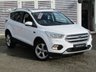 USED 2017 67 FORD KUGA 1.5 TITANIUM X 5d 148 BHP Finished in FROZEN WHITE with contrasting HEATED LEATHER TRIM. This Kuga is a great choice if you like driving. It's one of the most enjoyable, practical and fun family SUV's around. Features include PAN ROOF, Sat Nav, DAB, Electric Power Boot, Heated Full Leather, Heated Steering Wheel, Auto Parking, Cruise Control, 18" Alloys, B/Tooth and much more. Serviced at 9664 miles, 18548 miles, 26152 miles, 35074 miles, 43250 miles and on arrival at 51510 miles.