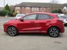 USED 2020 70 FORD PUMA 1.0 ST-LINE 5d 123 BHP Finished in LUCID RED METALLIC with Grey Trim. This Ford Puma certainly looks the part. It&rsquo;s got the raised up driving position, the eye-catching design, and a sort of miniature SUV shape. Features include Sat Nav, DAB Radio, B/Tooth, Apple Play, Virtual Dash and great Low Mileage. Dealer serviced at 8735 miles.