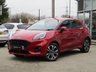USED 2020 70 FORD PUMA 1.0 ST-LINE 5d 123 BHP Finished in LUCID RED METALLIC with Grey Trim. This Ford Puma certainly looks the part. It&rsquo;s got the raised up driving position, the eye-catching design, and a sort of miniature SUV shape. Features include Sat Nav, DAB Radio, B/Tooth, Apple Play, Virtual Dash and great Low Mileage. Dealer serviced at 8735 miles.