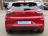USED 2020 70 FORD PUMA 1.0 ST-LINE 5d 123 BHP Finished in LUCID RED METALLIC with Grey Trim. This Ford Puma certainly looks the part. It&rsquo;s got the raised up driving position, the eye-catching design, and a sort of miniature SUV shape. Features include Sat Nav, DAB Radio, B/Tooth, Apple Play, Virtual Dash and great Low Mileage. Dealer serviced at 8735 miles.