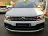 USED 2020 20 VOLKSWAGEN TIGUAN 2.0 R-LINE TECH TDI DSG 5d 148 BHP Finished in PURE WHITE with contrasting Alcantara trim. This high spec Tiguan has a more sophisticated look to add to its high quality interior and high spec. This Tiguan is spacious, comfortable and great to drive, while its raised driving position gives you a great view. Features include, Pan Roof, Nav, Virtual Dash, DAB, B/Tooth, ELECTRIC BOOT, 20" Alloys, Park Sensors and more. Dealer serviced at 26992 miles, 54806 miles and on arrival at 68599 miles.