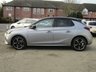 USED 2021 70 VAUXHALL CORSA 1.2 ELITE NAV PREMIUM 5d 100 BHP Finished in QUARTZ GREY with contrasting Dark Grey Cloth Trim. This Vauxhall Corsa is one of the most popular superminis around. This 5 door model is spacious, practical and economical. Ideal for the small family or 1st time driver. Features include Sat Nav, Apple Play, Heated Seats, Heated Steering Wheel, Cruise Control, DAB, B/Tooth, Front Fogs, Alloys, 2 Keys and much more. Dealer Serviced at 10377 miles and at 20777 miles.
