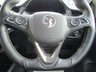 USED 2021 70 VAUXHALL CORSA 1.2 ELITE NAV PREMIUM 5d 100 BHP Finished in QUARTZ GREY with contrasting Dark Grey Cloth Trim. This Vauxhall Corsa is one of the most popular superminis around. This 5 door model is spacious, practical and economical. Ideal for the small family or 1st time driver. Features include Sat Nav, Apple Play, Heated Seats, Heated Steering Wheel, Cruise Control, DAB, B/Tooth, Front Fogs, Alloys, 2 Keys and much more. Dealer Serviced at 10377 miles and at 20777 miles.