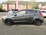 USED 2016 65 FORD FIESTA 1.0 TITANIUM 5d 99 BHP Finished in MAGNETIC GREY Metallic with contrasting GREY Cloth interior trim. This Fiesta is a small car that you can really enjoy driving. Economical and cheap to run, stylish to look at and some great features. ZERO Road Tax with DAB radio, B/Tooth, Alloys, Cruise Control, Power folding door mirrors, Climate and much more, makes this a must for the first time driver or small family. Dealer serviced at 24051 miles, 34660 miles, 70683 miles and at 84487 miles.