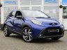 USED 2022 22 TOYOTA AYGO X 1.0 VVT-I EDGE 5d 71 BHP Finished in JUNIPER BLUE WITH BLACK and Dark Grey Sports Trim. The Toyota Aygo X is a raised ride height supermini that packs a surprisingly spacious interior and is great to drive. This affordable and economic Aygo X has some great spec which includes, 18" Alloys, Apple Play, Rear view Camera, Cruise Control DAB Radio, B/Tooth and much more. Dealer serviced at 6855 miles and is still under Toyota Warranty.