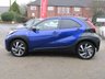 USED 2022 22 TOYOTA AYGO X 1.0 VVT-I EDGE 5d 71 BHP Finished in JUNIPER BLUE WITH BLACK and Dark Grey Sports Trim. The Toyota Aygo X is a raised ride height supermini that packs a surprisingly spacious interior and is great to drive. This affordable and economic Aygo X has some great spec which includes, 18" Alloys, Apple Play, Rear view Camera, Cruise Control DAB Radio, B/Tooth and much more. Dealer serviced at 6855 miles and is still under Toyota Warranty.