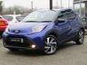 USED 2022 22 TOYOTA AYGO X 1.0 VVT-I EDGE 5d 71 BHP Finished in JUNIPER BLUE WITH BLACK and Dark Grey Sports Trim. The Toyota Aygo X is a raised ride height supermini that packs a surprisingly spacious interior and is great to drive. This affordable and economic Aygo X has some great spec which includes, 18" Alloys, Apple Play, Rear view Camera, Cruise Control DAB Radio, B/Tooth and much more. Dealer serviced at 6855 miles and is still under Toyota Warranty.