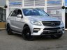 USED 2013 63 MERCEDES-BENZ M-CLASS 2.1 ML250 BLUETEC AMG SPORT 5d 204 BHP Finished in DIAMOND SILVER with HEATED LEATHER/ALCANTARA ELECTRIC SEATS. This ML is an upmarket SUV with a quality interior and plenty of space inside. This SUV has arguably the poshest feeling cabin in its class. Features include Pan Roof, Sat Nav, Full Heated Memory Leather, Electric boot, 21" Black Alloys, Parking Sensors, Running Boards and more. Dealer serviced at 12589 miles, 21763 miles, 35209 miles, 46028 miles, 57271 miles, 68059 miles, 78059 miles, 93998 miles and at  100981 miles.