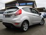USED 2013 63 FORD FIESTA 1.2 ZETEC 3d 81 BHP Finished in MOONDUST SILVER MET with contrasting GREY Cloth Trim. This Fiesta is a small family 3 door car that you can really enjoy driving. Economical and cheap to run, stylish to look at and some great features. Specification includes &pound;30 Road Tax, B/Tooth, Rear Park Sensors, Alloys, Air Con, Heated front Screen and more, makes this a must for the first time driver or small family. Serviced at 10383 miles, 12905 miles, 15214 miles, 17286 miles, 21164 miles, 25630 miles and at 27300 miles