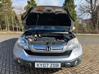 USED 2007 07 HONDA CR-V 2.2 I-CTDI ES 5d 139 BHP Experience the epitome of reliability with the 2007 Honda CR-V 2.2 I-CTDI ES. This metallic silver beauty has gracefully covered 233,000 miles, a testament to Honda's renowned durability.