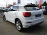 USED 2019 19 AUDI Q2 1.6 TDI S LINE 5d 114 BHP Finished in IBIS WHITE with contrasting BLACK SPORTS TRIM. This Audi Q2 is designed to give you the feel-good factor of an Audi A3, but with a higher driving position and the extra feeling of security that comes with it. This great example has features that include Pan Roof, Sat Nav, Power Folding Mirrors, Power rear boot, 18" Alloys, Cruise Control, Park Sensors, DAB, B/Tooth and much more. Dealer serviced at 8639 miles, 17756 miles and on arrival at 42263 miles.