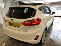 USED 2017 67 FORD FIESTA 1.0 TITANIUM 3d 99 BHP+PANORAMIC SUNROOF+SATNAV+2KEYS+ 2 KEYS+PANORAMIC ROOF+1 OWNER FROM NEW+AIRCON+PARKING SENSORS+HISTORY+NAV+ALLOYS+FROZEN WHITE PAINT+CLOTH TRIM+USB+MEDIA+AUX+HPI CLEAR+VOSA MOT HISTORY,+FULL DEALER FACILITIES+GOOD MPG,+RAC CHECKED+ The car is in very good condition in and out . Bodywork has no obvious dents or scratches . Interior is very clean without any obvious wear or tear to the seats or carpets.Tyres excellent ,Engine+gearbox in good order.