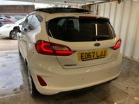 USED 2017 67 FORD FIESTA 1.0 TITANIUM 3d 99 BHP+PANORAMIC SUNROOF+SATNAV+2KEYS+ 2 KEYS+PANORAMIC ROOF+1 OWNER FROM NEW+AIRCON+PARKING SENSORS+HISTORY+NAV+ALLOYS+FROZEN WHITE PAINT+CLOTH TRIM+USB+MEDIA+AUX+HPI CLEAR+VOSA MOT HISTORY,+FULL DEALER FACILITIES+GOOD MPG,+RAC CHECKED+ The car is in very good condition in and out . Bodywork has no obvious dents or scratches . Interior is very clean without any obvious wear or tear to the seats or carpets.Tyres excellent ,Engine+gearbox in good order.