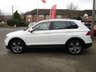USED 2019 19 VOLKSWAGEN TIGUAN 1.5 MATCH TSI EVO DSG 5d 148 BHP Finished in PURE WHITE with contrasting Cloth trim. This high spec Tiguan has a more sophisticated look to add to its high quality interior. This Tiguan is spacious, comfortable and great to drive, while its raised driving position gives you a great view. Features include, Sat Nav, Rear Camera, Auto Parking, Cruise, DAB, B/Tooth, 19" Alloys, Park Sensors and more. Dealer serviced at 19114 miles, 28668 miles, 45950 miles, 64850 miles, 71268 miles (Inc Gearbox Oil),82399 miles and at 94196 miles.