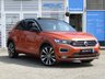 USED 2019 69 VOLKSWAGEN T-ROC 1.5 R-LINE TSI EVO DSG 5d 148 BHP Finished in ENERGETIC ORANGE MET with BLACK ROOF and contrasting Sports Trim. This T-Roc is for those who want a compact SUV with smart styling and a good level of practicality. This Golf based SUV is both practical and fun to drive. Features include, Pan Roof, Sat Nav, VIRTUAL DASH, Apple Play, 19" Alloys, DAB Radio, Part Leather Trim, Rear Electric Boot and Rear Camera and much more. Just Dealer serviced at 88836 miles on 13/4/2024.