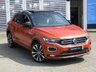 USED 2019 69 VOLKSWAGEN T-ROC 1.5 R-LINE TSI EVO DSG 5d 148 BHP Finished in ENERGETIC ORANGE MET with BLACK ROOF and contrasting Sports Trim. This T-Roc is for those who want a compact SUV with smart styling and a good level of practicality. This Golf based SUV is both practical and fun to drive. Features include, Pan Roof, Sat Nav, VIRTUAL DASH, Apple Play, 19" Alloys, DAB Radio, Part Leather Trim, Rear Electric Boot and Rear Camera and much more. Just Dealer serviced at 88836 miles on 13/4/2024.