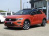 USED 2019 69 VOLKSWAGEN T-ROC 1.5 R-LINE TSI EVO DSG 5d 148 BHP Finished in ENERGETIC ORANGE MET with BLACK ROOF and contrasting Sports Trim. This T-Roc is for those who want a compact SUV with smart styling and a good level of practicality. This Golf based SUV is both practical and fun to drive. Features include, Pan Roof, Sat Nav, VIRTUAL DASH, Apple Play, 19" Alloys, DAB Radio, Part Leather Trim, Rear Electric Boot and Rear Camera and much more. Just Dealer serviced at 88836 miles on 13/4/2024.