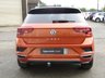 USED 2019 69 VOLKSWAGEN T-ROC 1.5 R-LINE TSI EVO DSG 5d 148 BHP Finished in ENERGETIC ORANGE MET with BLACK ROOF and contrasting Sports Trim. This T-Roc is for those who want a compact SUV with smart styling and a good level of practicality. This Golf based SUV is both practical and fun to drive. Features include, Pan Roof, Sat Nav, VIRTUAL DASH, Apple Play, 19" Alloys, DAB Radio, Part Leather Trim, Rear Electric Boot and Rear Camera and much more. Just Dealer serviced at 88836 miles on 13/4/2024.