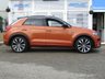 USED 2019 69 VOLKSWAGEN T-ROC 1.5 R-LINE TSI EVO DSG 5d 148 BHP Finished in ENERGETIC ORANGE MET with BLACK ROOF and contrasting Sports Trim. This T-Roc is for those who want a compact SUV with smart styling and a good level of practicality. This Golf based SUV is both practical and fun to drive. Features include, Pan Roof, Sat Nav, VIRTUAL DASH, Apple Play, 19" Alloys, DAB Radio, Part Leather Trim, Rear Electric Boot and Rear Camera and much more. Just Dealer serviced at 88836 miles on 13/4/2024.
