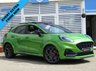 USED 2021 21 FORD PUMA 1.5 ST 5d 198 BHP Finished in MEAN GREEN METALLIC with HEATED RECARO LEATHER/ALCANTARA Trim. This Ford Puma certainly looks the part, it is the sportiest version of the Puma compact SUV, with meaner looks and a racier setup, It's got the raised up driving position, the eye-catching design, and a miniature SUV shape. Features include Pan Roof, Sat Nav with Virtual Dash, DAB Radio, Power Boot, Rear Camera, B/Tooth, Apple Play, Low Mileage and much more. Dealer serviced at 8577 miles, 18588 miles and at 24100 miles