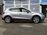 USED 2022 71 SEAT ARONA 1.0 ECOTSI FR DSG 5d 109 BHP Finished in URBAN SILVER METALLIC with GREY CLOTH Trim. Seat have turned out this great looking small SUV. This SUV looks good and drives just as well. It offers great value for money and is not to be missed. Features include Sat Nav, Park Sensors, DAB Radio, B/Tooth, 17" Alloys, Power Folding Door Mirrors and much more. Serviced at 12096 miles, 29042 miles and on arrival at 73815 miles.