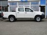 USED 2014 14 TOYOTA HI-LUX 2.5 ACTIVE 4X4 D-4D DCB 142 BHP Finished in WHITE with GREY CLOTH TRIM. This refined and rugged and very clean HI-LUX is the complete pick-up package. It is stylish, practical and capable of hauling huge loads. Features include, NO VAT, Cruise Control, Rear View Camera, B/Tooth and much more. Serviced at 38864 miles, 47292 miles ( inc Cam Belt Kit), 53187 miles, 66220 miles, 66638 miles (Dinitrol Underside Rust Protection Treatment) and serviced on arrival at 77078 miles.