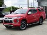 USED 2020 70 MITSUBISHI L200 2.3 DI-D WARRIOR DCB 148 BHP Finished in VOLCANIC RED MET with contrasting GREY Cloth Interior. This pick up is as rough and as tough as they come with great safety credentials and a four star rating from Euro NCAP. This is a great Used Pick Up Truck. Features include, Truckman Top, DAB Radio, B/Tooth, Cruise Control, Front Fogs, Sat Nav Rear View Camera and much more. Serviced at 13297 miles, 39761 miles 53028 miles and on arrival at 70234 miles.